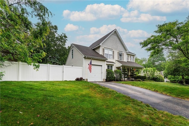 50 S Pond Dr, Coventry, RI 02816 - view of front facade with driveway and an attached garage