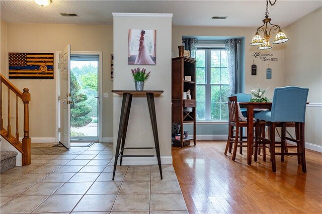 50 S Pond Dr, Coventry, RI 02816 - foyer with stairway and light wood-style flooring