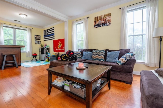 50 S Pond Dr, Coventry, RI 02816 - living room featuring crown molding, light wood-type flooring, plenty of natural light, and beamed ceiling