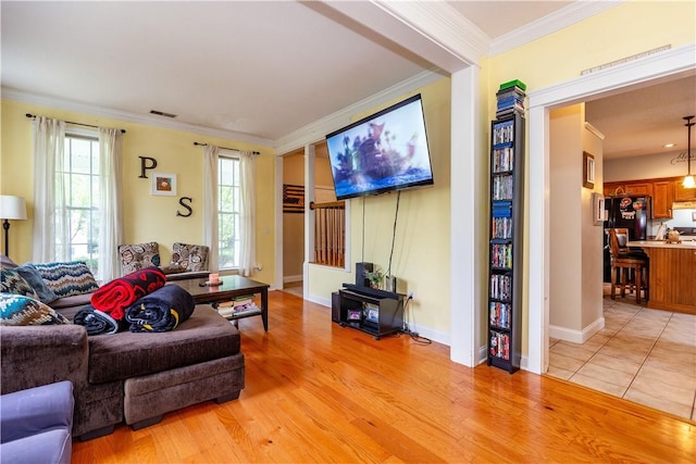 50 S Pond Dr, Coventry, RI 02816 - living area featuring crown molding and light wood-type flooring