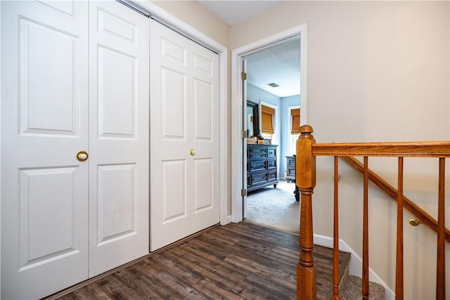 50 S Pond Dr, Coventry, RI 02816 - hallway featuring an upstairs landing and dark wood-type flooring