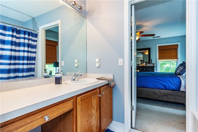 50 S Pond Dr, Coventry, RI 02816 - bathroom with ceiling fan, ensuite bath, and vanity