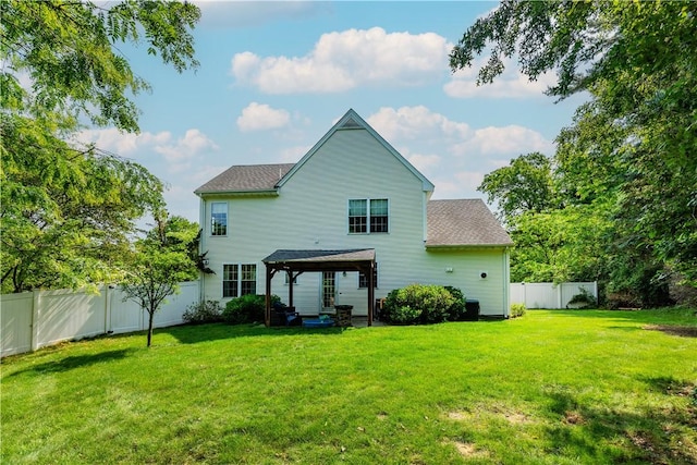 50 S Pond Dr, Coventry, RI 02816 - rear view of house with a fenced backyard, roof with shingles, and a gazebo