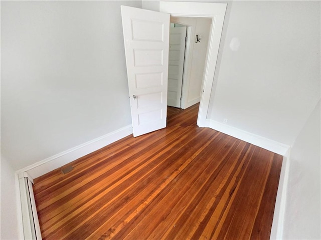 156 Broad St, Burrillville, RI 02859 - unfurnished room with baseboards and dark wood finished floors