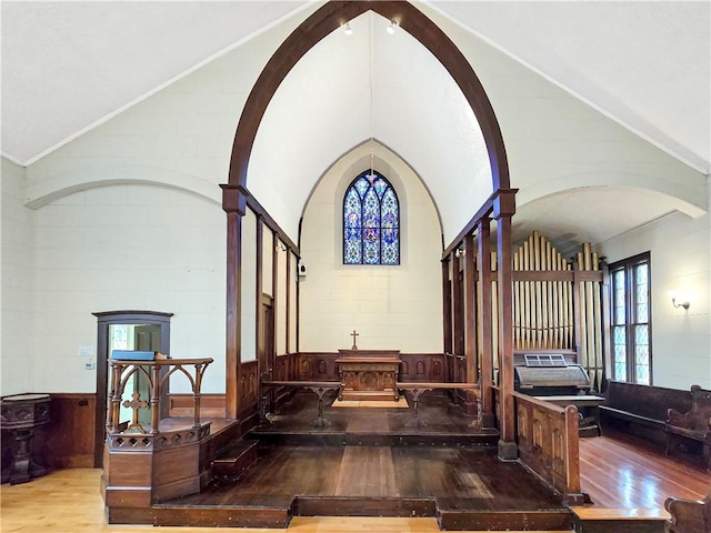 156 Broad St, Burrillville, RI 02859 - entrance foyer featuring hardwood / wood-style flooring, plenty of natural light, lofted ceiling, and wainscoting