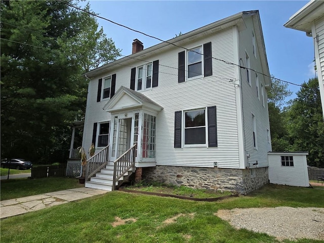 156 Broad St, Burrillville, RI 02859 - colonial inspired home featuring a chimney and a front lawn