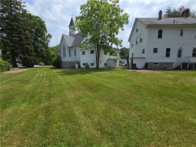156 Broad St, Burrillville, RI 02859 - view of grassy yard with stairway