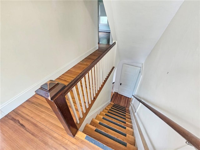 156 Broad St, Burrillville, RI 02859 - stairs featuring wood finished floors and baseboards