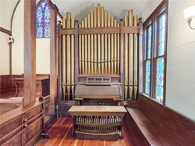 156 Broad St, Burrillville, RI 02859 - detailed view of wood finished floors and a textured ceiling
