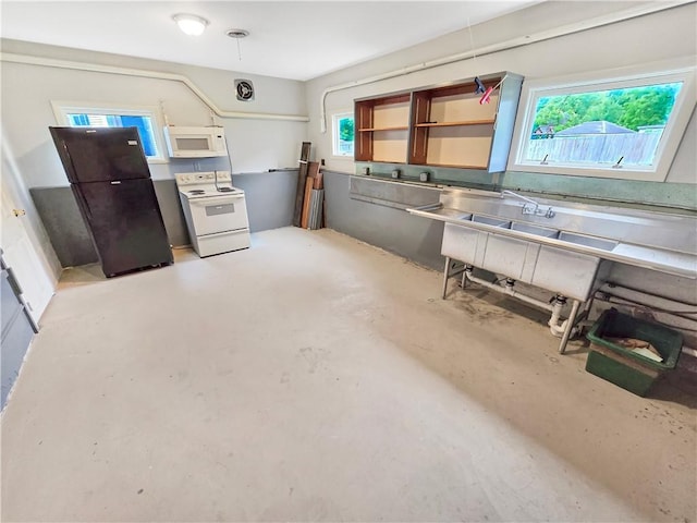 156 Broad St, Burrillville, RI 02859 - kitchen featuring white appliances, healthy amount of natural light, concrete floors, and open shelves