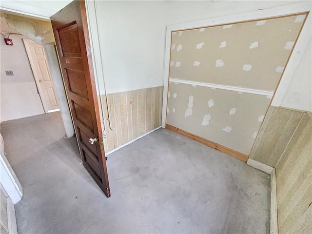 156 Broad St, Burrillville, RI 02859 - unfurnished bedroom featuring unfinished concrete floors