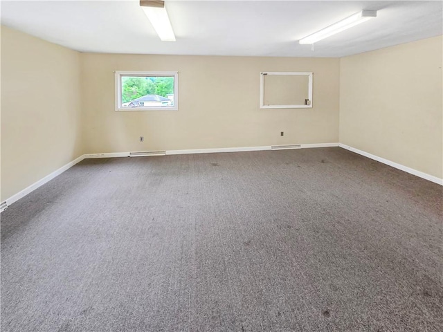 156 Broad St, Burrillville, RI 02859 - carpeted spare room featuring baseboards