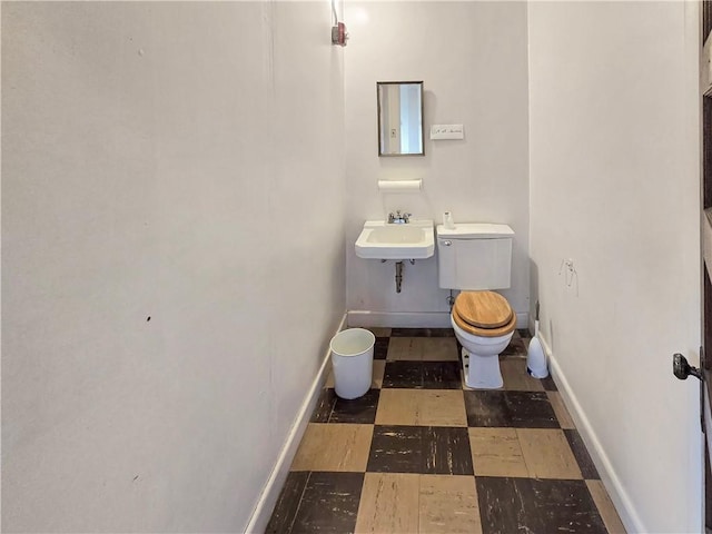 156 Broad St, Burrillville, RI 02859 - bathroom with a sink and tile patterned floors