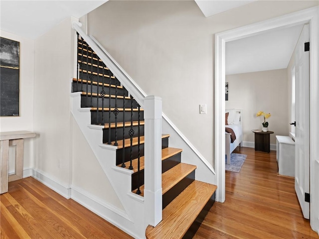 155 Hillside Ave, Providence, RI 02906 - staircase featuring wood finished floors and baseboards