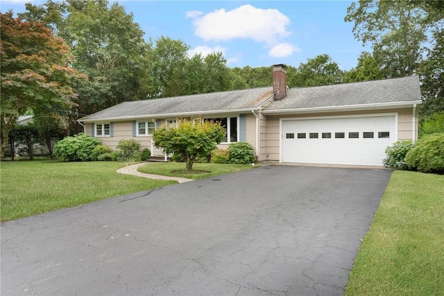 185 Sunnybrook Dr, North Kingstown, RI 02852 - ranch-style house with asphalt driveway, an attached garage, a chimney, and a front lawn