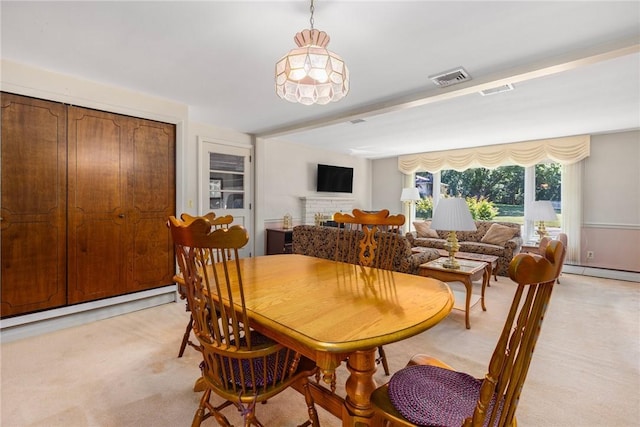 185 Sunnybrook Dr, North Kingstown, RI 02852 - dining area featuring light carpet and a baseboard radiator