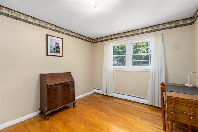 185 Sunnybrook Dr, North Kingstown, RI 02852 - bedroom with light wood-style floors and baseboard heating