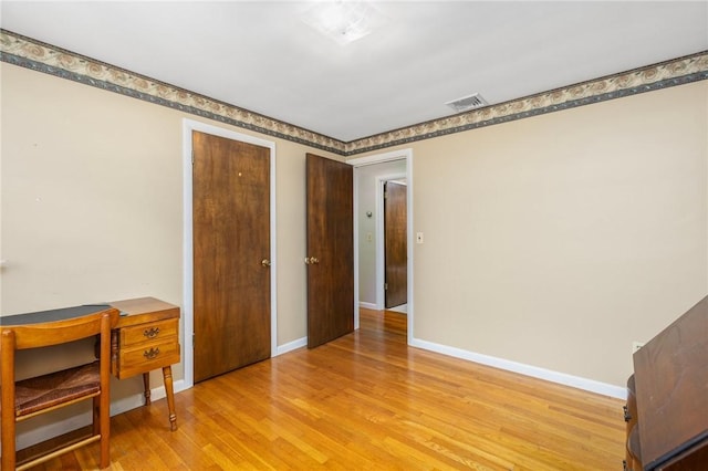 185 Sunnybrook Dr, North Kingstown, RI 02852 - unfurnished office featuring baseboards and light wood-style flooring