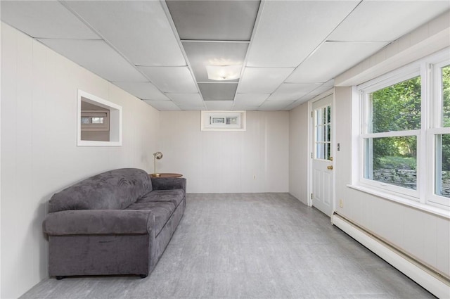 185 Sunnybrook Dr, North Kingstown, RI 02852 - sitting room with a baseboard heating unit and wooden walls