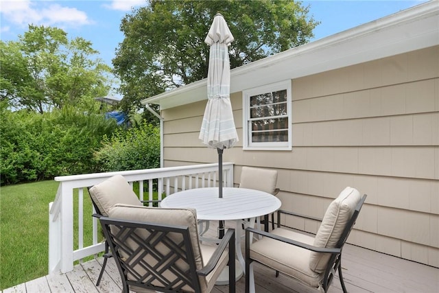 185 Sunnybrook Dr, North Kingstown, RI 02852 - wooden deck featuring outdoor dining space and a lawn