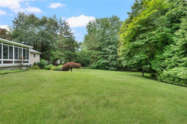 185 Sunnybrook Dr, North Kingstown, RI 02852 - view of green lawn with a sunroom
