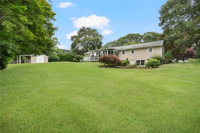 185 Sunnybrook Dr, North Kingstown, RI 02852 - view of green lawn featuring a storage shed
