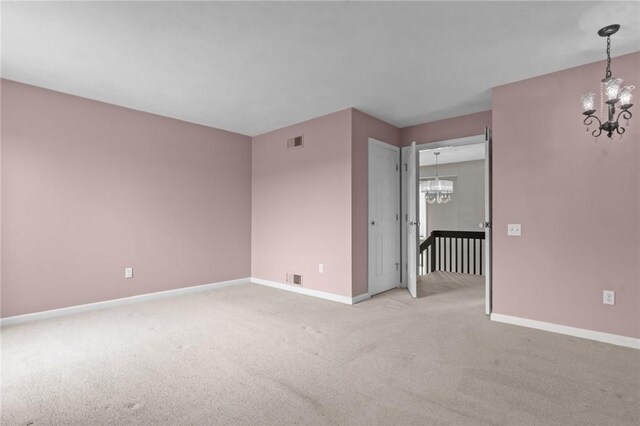 76 Valley Green Ct Unit B, North Providence, RI 02904 - unfurnished room featuring a chandelier and light colored carpet