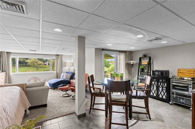 76 Valley Green Ct Unit B, North Providence, RI 02904 - dining area with a drop ceiling and light tile patterned floors