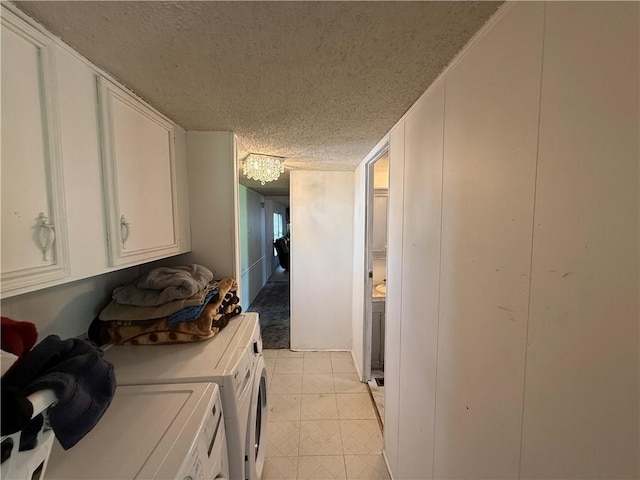 225 Brayton Ave, Tiverton, RI 02878 - washroom with washing machine and clothes dryer, a textured ceiling, cabinet space, and light flooring