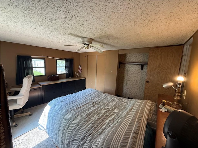225 Brayton Ave, Tiverton, RI 02878 - bedroom with carpet floors, a textured ceiling, ceiling fan, and a desk