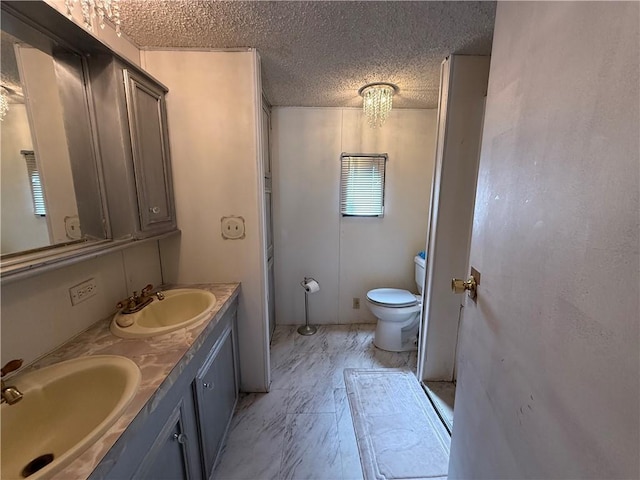 225 Brayton Ave, Tiverton, RI 02878 - bathroom with double vanity and a textured ceiling