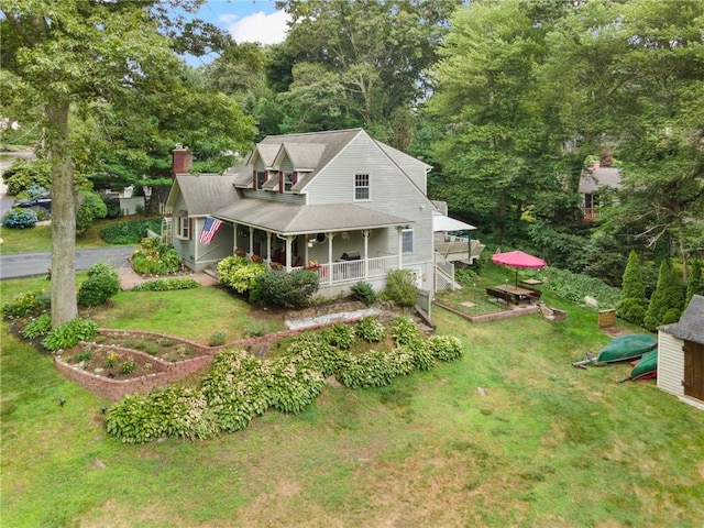 50 Betony Rd, Narragansett, RI 02874 - view of front of house with a porch, a front yard, and a chimney
