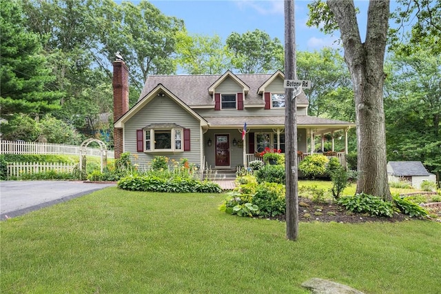 50 Betony Rd, Narragansett, RI 02874 - view of front of home with a porch, a chimney, and a shingled roof