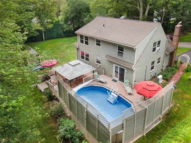 50 Betony Rd, Narragansett, RI 02874 - rear view of property featuring a deck, a fenced backyard, a gazebo, and roof with shingles