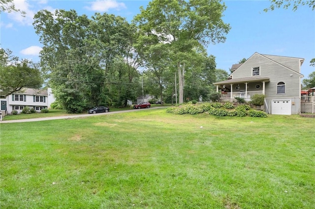 50 Betony Rd, Narragansett, RI 02874 - view of grassy yard featuring a garage