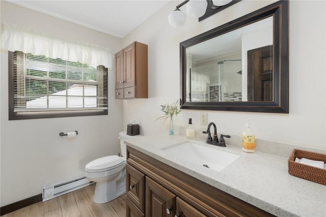 50 Betony Rd, Narragansett, RI 02874 - full bath with a baseboard heating unit, vanity, a shower, and wood finished floors
