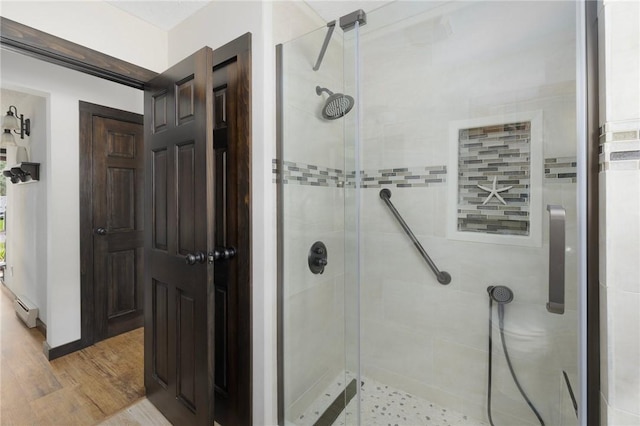50 Betony Rd, Narragansett, RI 02874 - bathroom featuring a shower stall and wood finished floors