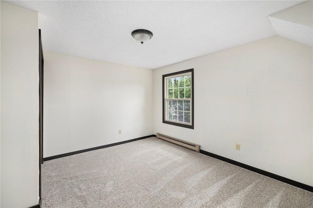 50 Betony Rd, Narragansett, RI 02874 - empty room with baseboard heating, carpet floors, and a textured ceiling