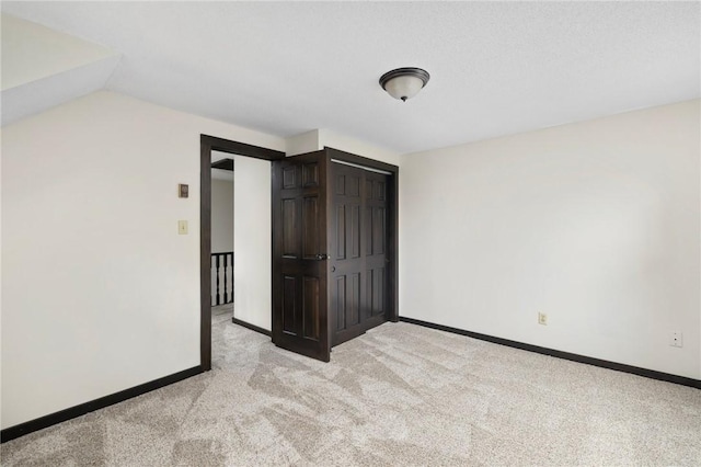 50 Betony Rd, Narragansett, RI 02874 - unfurnished bedroom with light carpet and a closet