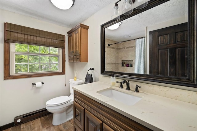 50 Betony Rd, Narragansett, RI 02874 - bathroom featuring vanity, wood finished floors, curtained shower, and baseboard heating