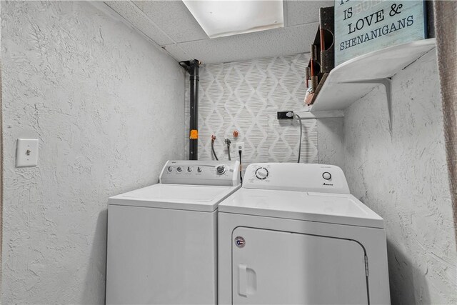 59 Columbus Ave, North Providence, RI 02911 - laundry area with washing machine and dryer and a textured wall