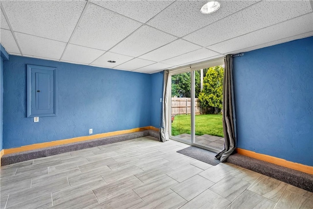 59 Columbus Ave, North Providence, RI 02911 - unfurnished room with electric panel and a drop ceiling