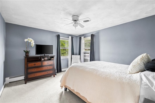 59 Columbus Ave, North Providence, RI 02911 - carpeted bedroom with a baseboard radiator, baseboard heating, and ceiling fan