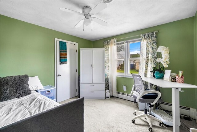 59 Columbus Ave, North Providence, RI 02911 - bedroom with carpet floors, baseboard heating, and a ceiling fan