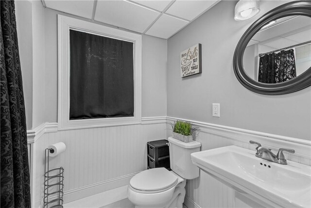 59 Columbus Ave, North Providence, RI 02911 - full bathroom with wainscoting and curtained shower