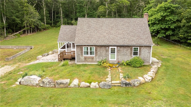 140 Long Hwy, Little Compton, RI 02837 - view of front of house with a chimney, a shingled roof, a front lawn, and a deck