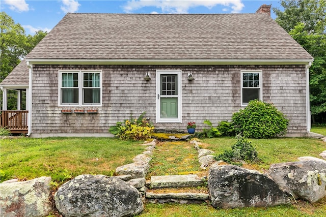 140 Long Hwy, Little Compton, RI 02837 - view of front of property with a front lawn, a chimney, and roof with shingles