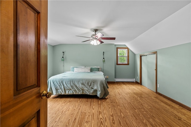 140 Long Hwy, Little Compton, RI 02837 - bedroom featuring a baseboard radiator, light wood finished floors, vaulted ceiling, and ceiling fan