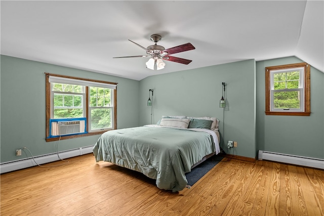 140 Long Hwy, Little Compton, RI 02837 - bedroom featuring baseboard heating, wood finished floors, lofted ceiling, and ceiling fan