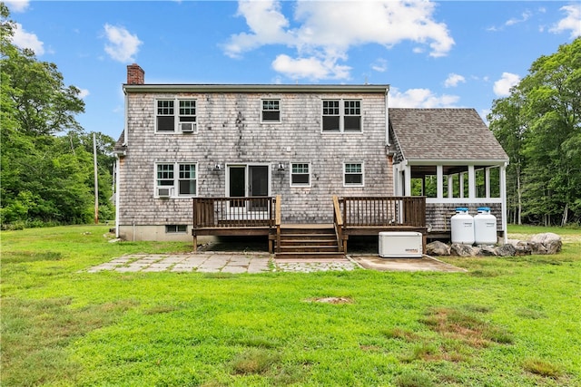 140 Long Hwy, Little Compton, RI 02837 - back of property with a chimney, a wooden deck, a lawn, and a patio area